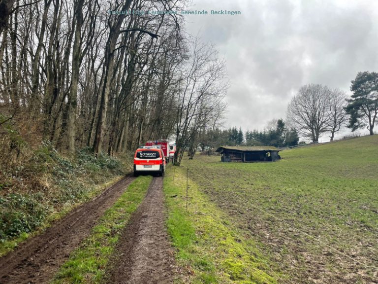 Person unter Fahrzeug